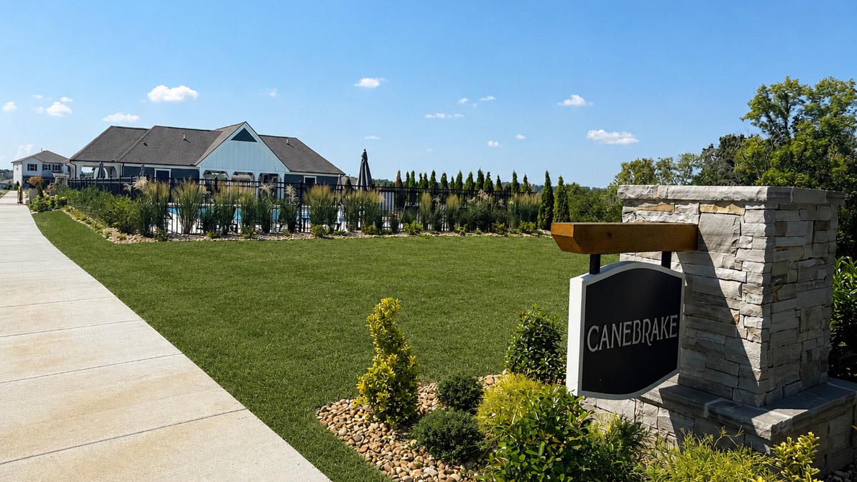 Canebrake entrance sign with the neighborhood pool and pool house behind it in Old Hickory, Tennessee